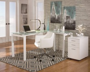 Simple and sleek home office desk with chevron gray rug with matching filing drawers.