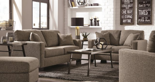 This ash sofa and loveseat keeps a neutral but high-fashion look with its tweed weave upholstery
