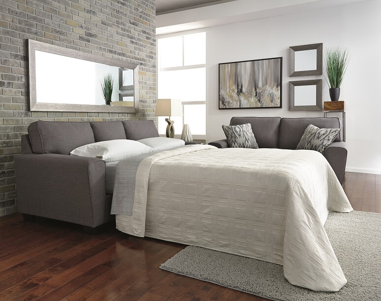 Contemporary pull out sofa in a chic gray with flared arms