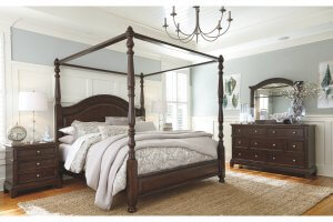 lavidor king canopy bed, dark wood, light bedding, set in a bedroom