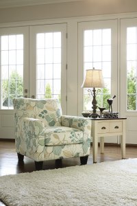 Daystar chair with floral print and pastel colors.