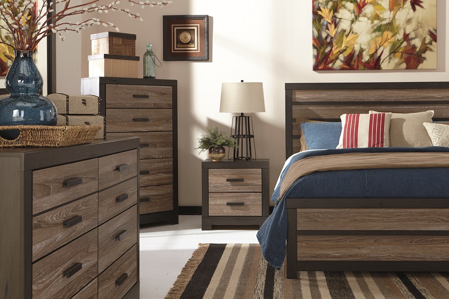 modern chic vintage gray and dark brown king bed set with dresser, night table and rug.
