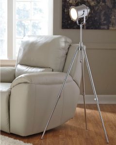 And ashley floor lamp standing next to a recliner