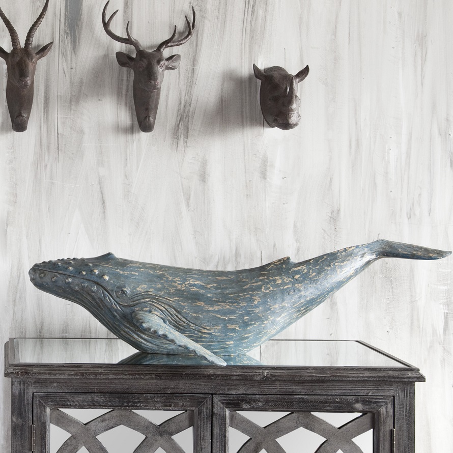 Blue whale coffee table decor for coastal theme home decoration ideas.