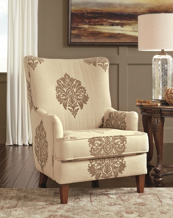 Traditional neutral accent chair with a toile design