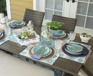 Outdoor table setting with coastal decor for summer