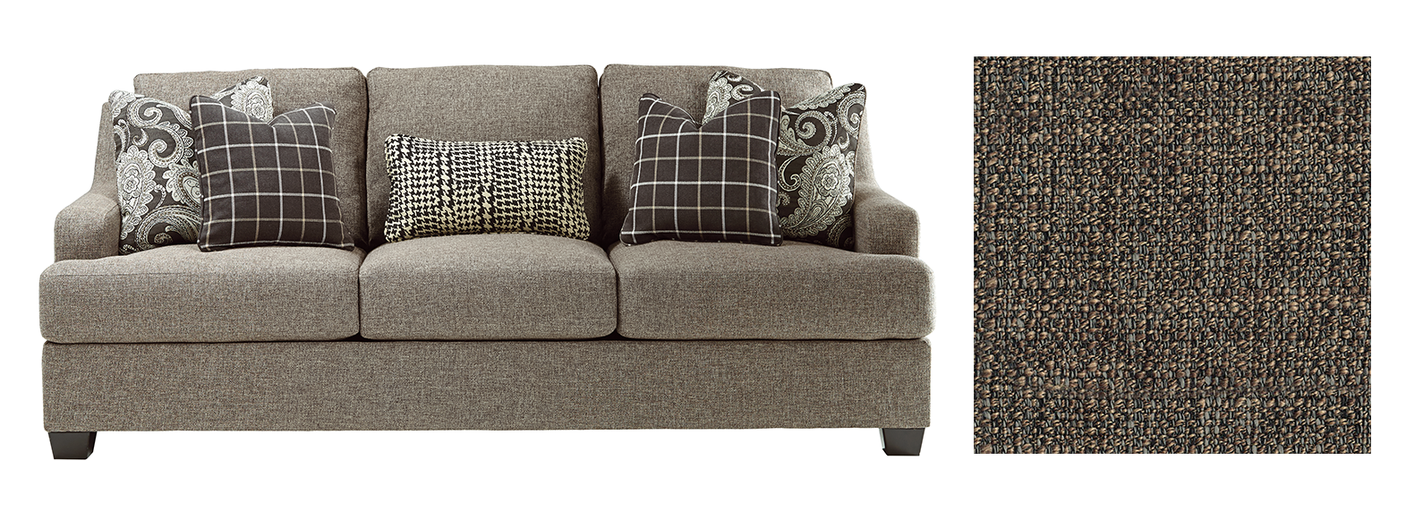 Light gray grainy sofa with dark colored pillows with a paisley design. 