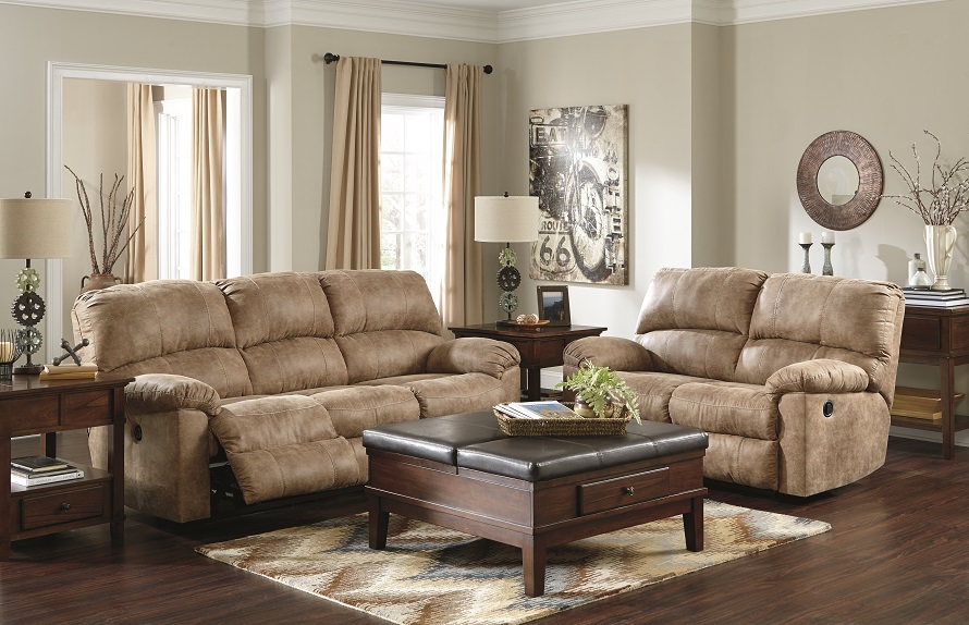 Deep Tufted Cushioning on the Birch Brown Loveseat and Power Reclining Sofa Set Accented with the Ottoman Coffee Table
