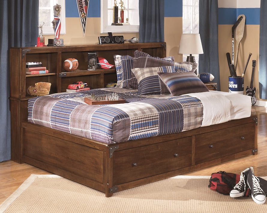 bookcase headboard and under bed drawers provides storage on this twin bed