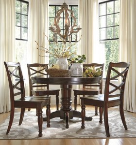 traditional styled round kitchen table and chairs in a deep brown finish