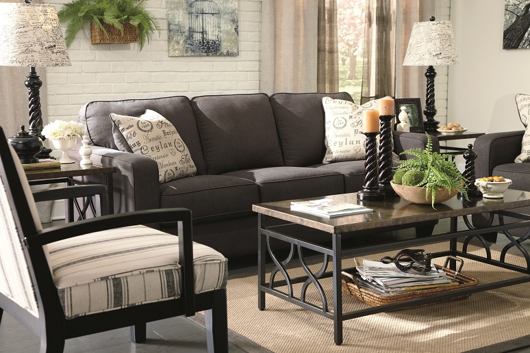 This living room set features a sofa in black