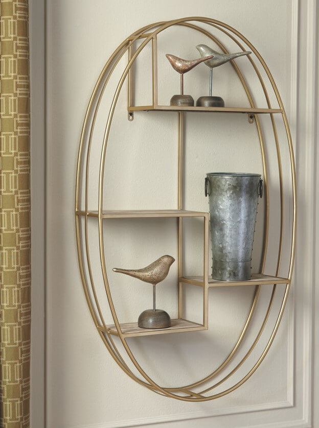 gold wall shelf with accessories