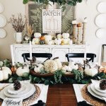 dining room table decorated for fall with pumpkins