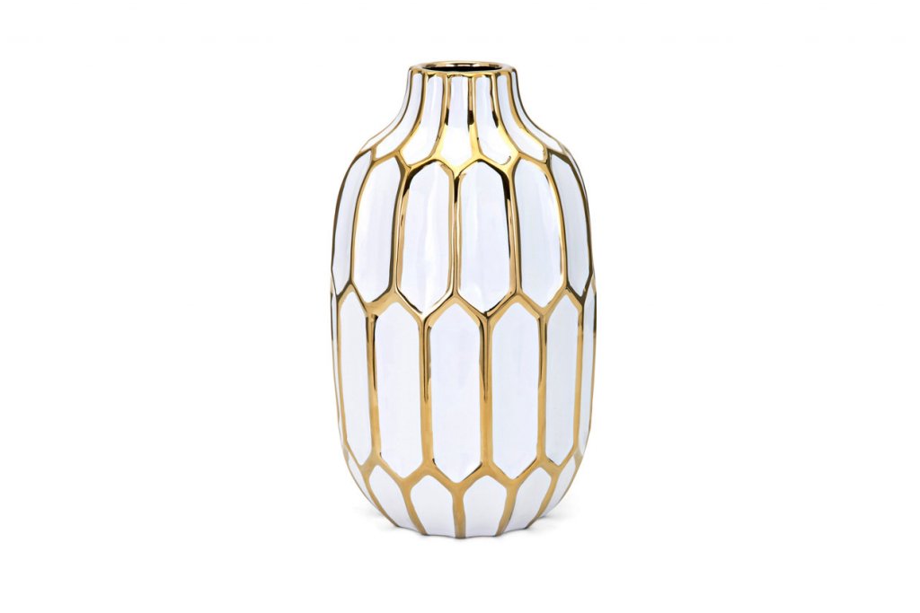 white and gold vase