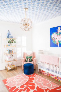 Nursery with colored ceiling.