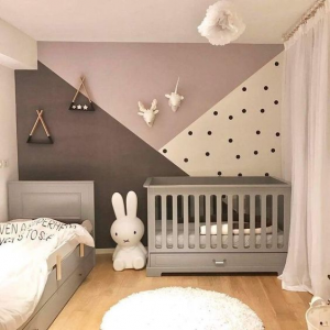 Children's room with alternating colored walls.