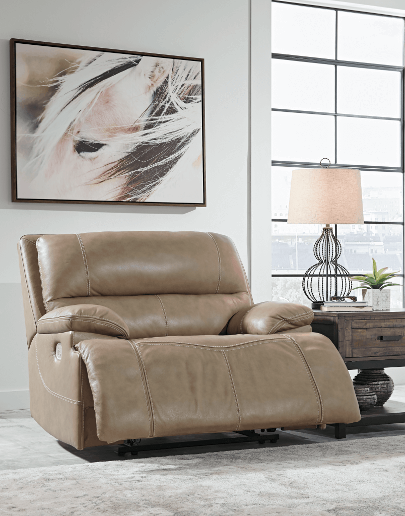Example of an extra roomy leather recliner for living room furniture.
