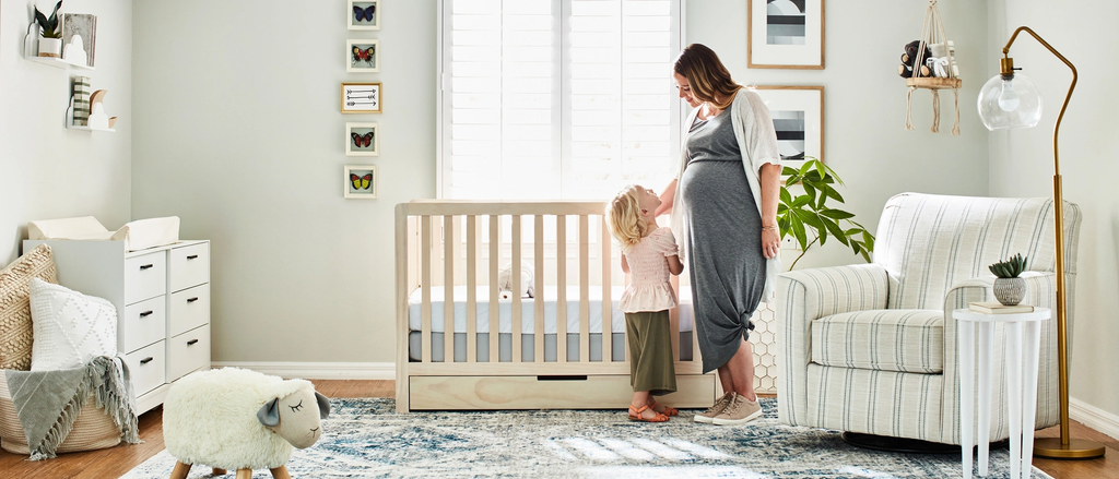 Mother and child in kids bedroom