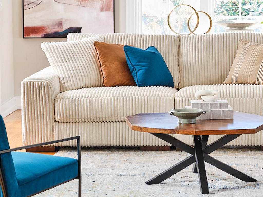 Living room furniture with blue and orange accent color decor
